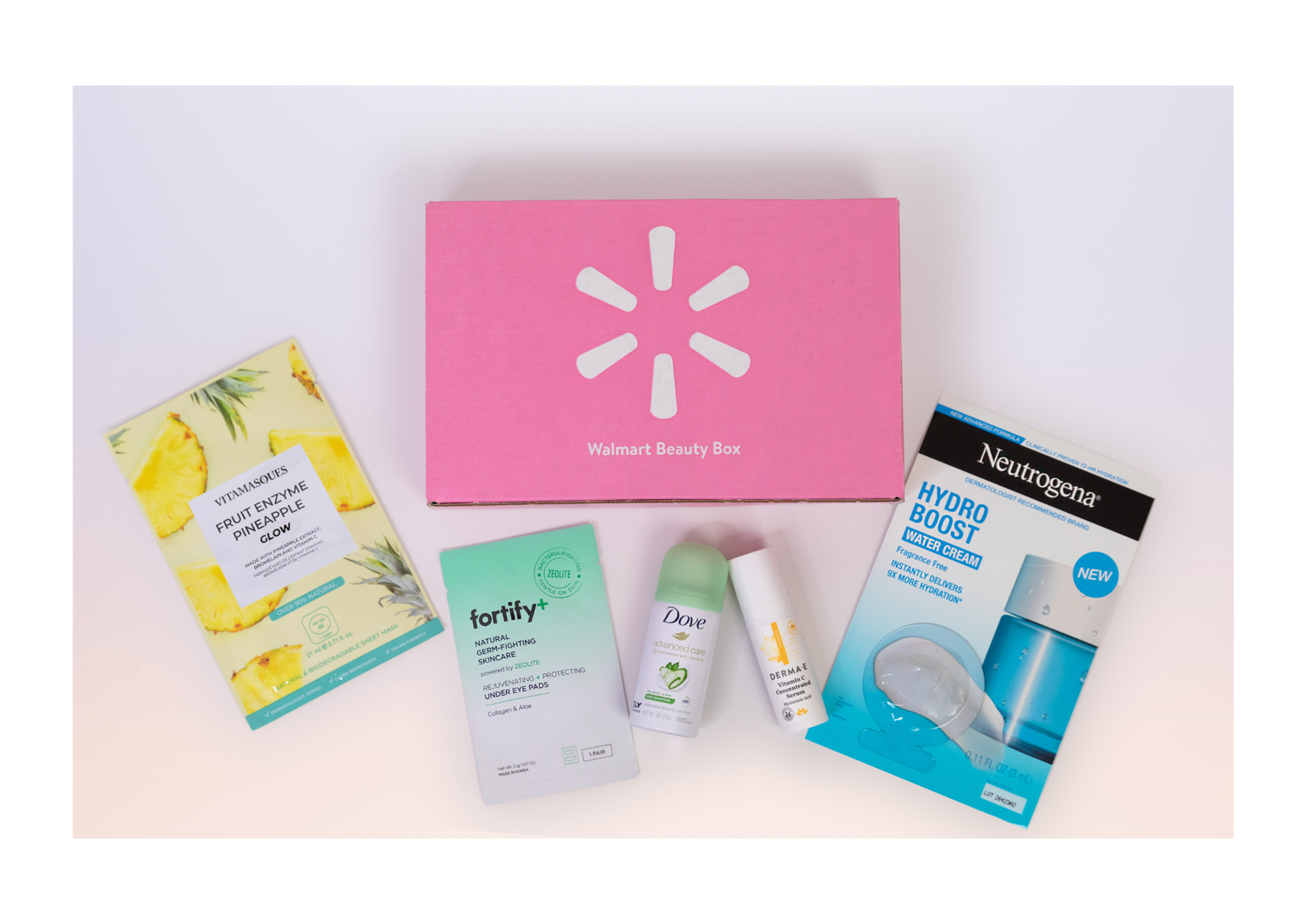 The Spring 2024 Walmart Beauty Box is shown along with some of the season's featured products from Vitamasques, Dove, Neutrogena, and more.
